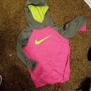 A neon pink nike jacket